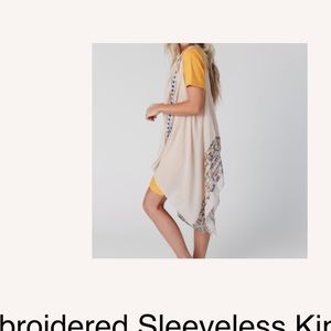 Ivory embroidered kimono from three birds nest, never won